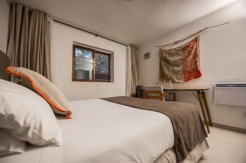 Postel nebo postele na pokoji v ubytování Hotel La Casa de Don Tomás