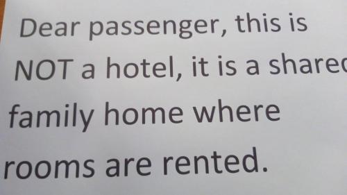 a sign that says dear passenger this is not a hotel at Arroyo de la Miel centro in Benalmádena