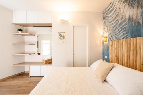 Cadamare charming rooms in Portovenereにあるベッド