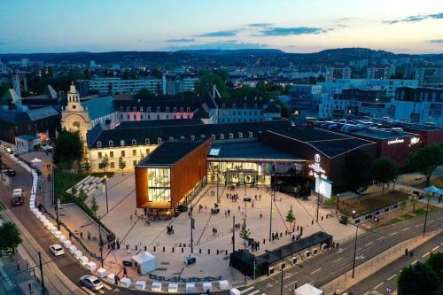 an aerial view of a city with a building at Les Minoteries Aux portes de la gastronomie in Dijon