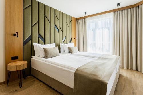 Natura All Seasons Boutique Hotel — Room