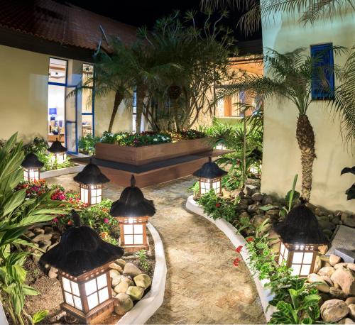 Κήπος έξω από το Praia Hotel Imbituba