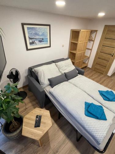 a bedroom with a bed in a room at Apartmány Kašper in Levoča