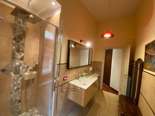 a bathroom with a sink and a shower at Il Nido del Falco in Castel Gandolfo