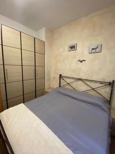 Postel nebo postele na pokoji v ubytování Appartamento Ruscello sulle piste