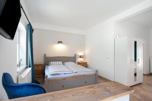 Katil atau katil-katil dalam bilik di Ferienhaus 'Zum tänzelnden Pony'