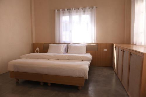 Cama o camas de una habitación en Neoli