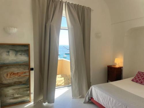 Postel nebo postele na pokoji v ubytování Incanto Blu Capri