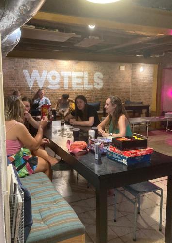 a group of people sitting at a table at WOT New Lisbon in Lisbon