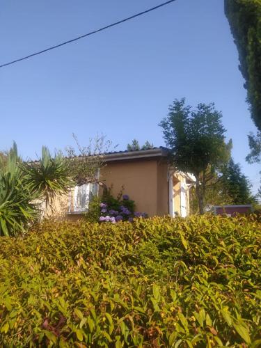 Κήπος έξω από το Maison dans un écrin de verdure