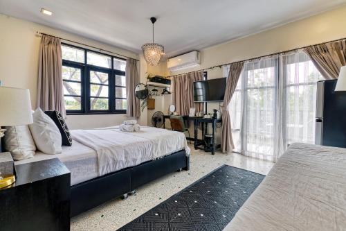 Кровать или кровати в номере Rattana House Homestay