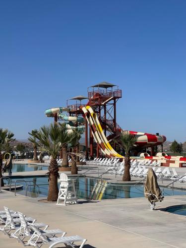 a water park with a roller coaster and slides at Zion Utah Jellystone Park in Hurricane