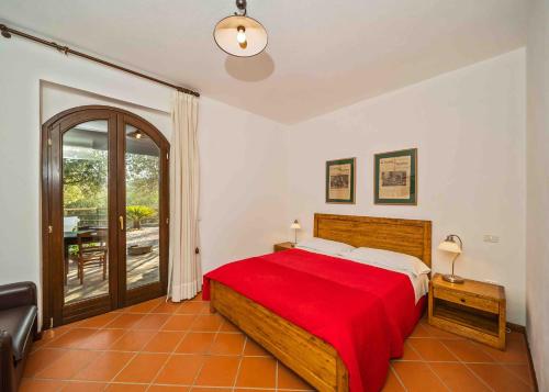Ein Bett oder Betten in einem Zimmer der Unterkunft Ristolab - Ritiro Mediterraneo