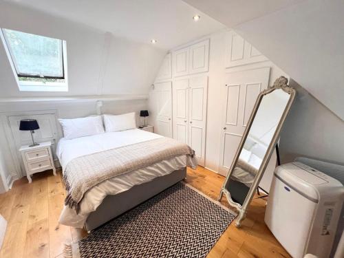 Voodi või voodid majutusasutuse 2 Bed Holiday Home with River Views toas