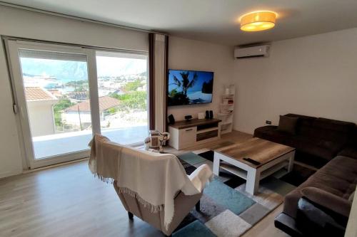 Χώρος καθιστικού στο Nature Bay Apartment