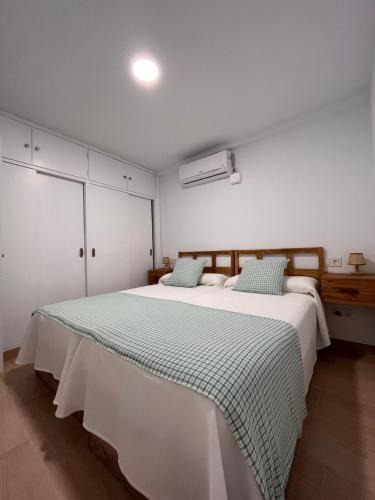 Ένα ή περισσότερα κρεβάτια σε δωμάτιο στο Apartamento 1 dormitorio - Geraneos 14