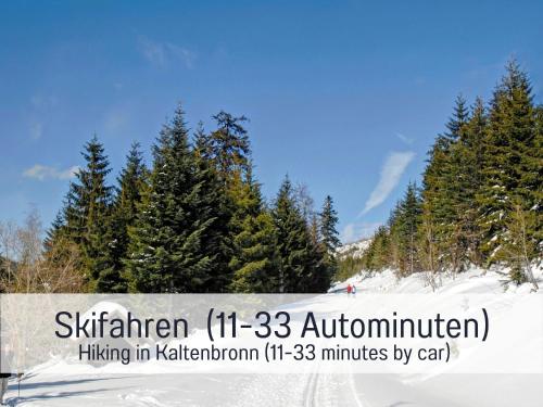 a sign on the side of a snow covered slope at Historisches Gerberhaus in Alpirsbach