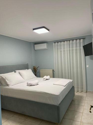 Ένα ή περισσότερα κρεβάτια σε δωμάτιο στο Fay's Apartment