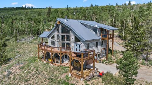 an overhead view of a tree house with a solarium at Custom 2BR & Loft Home, with Hot Tub & Stunning Views in Alma