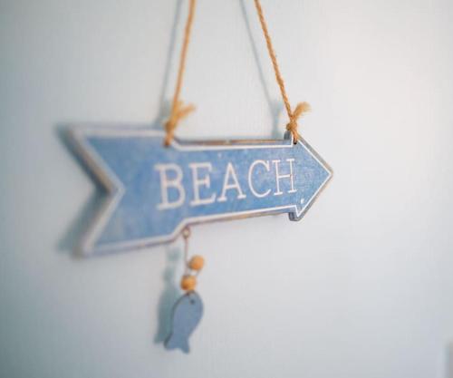 a blue star ornament with the word peace at Olivia Cottage - a Home From Home by the Sea in Morecambe