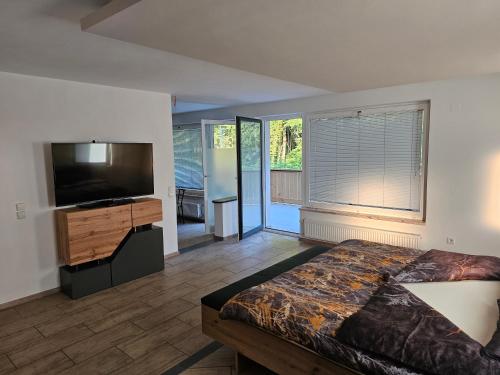 Postel nebo postele na pokoji v ubytování Grmač Apartments