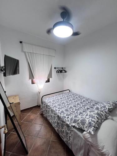 Ένα ή περισσότερα κρεβάτια σε δωμάτιο στο Casa Cabello