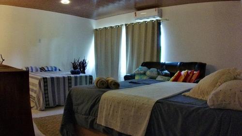 Ένα ή περισσότερα κρεβάτια σε δωμάτιο στο japasollarflat 2