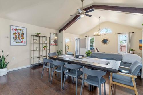 a dining room and living room with a table and chairs at 3 bedrooms AC Ranch Near Casinos and Beach in Atlantic City