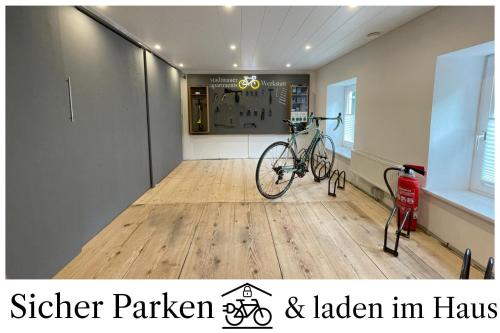 a bike parked in a room with a store at stadtmauer apartments - Großzügige luxuriöse Wohnung an der Stadtmauer - ideal für Familien in Nördlingen
