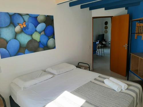 Ένα ή περισσότερα κρεβάτια σε δωμάτιο στο Villaremanso01