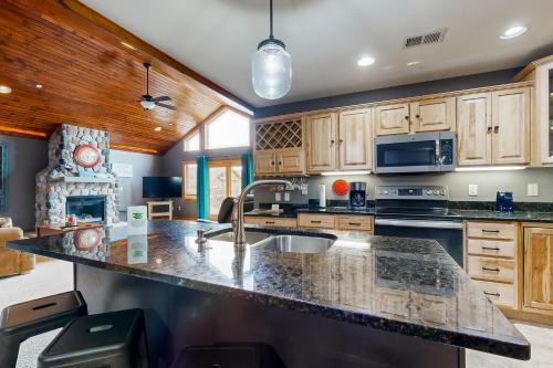 a kitchen with a sink and a counter top at Sunset Condominiums: The View in Arkdale