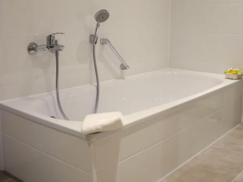 Koupelna v ubytování Hotel am Huntepadd