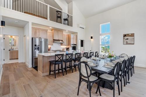 an open kitchen and dining room with a table and chairs at Whitewater Estate House & Guesthouse w Hot Tub in Buena Vista