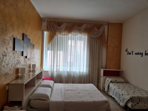 Postel nebo postele na pokoji v ubytování Bed and Breakfast Trestelle