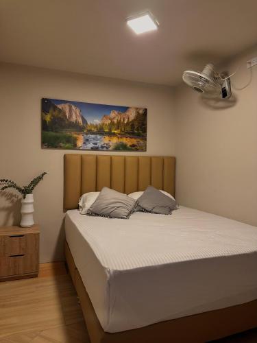 Cama o camas de una habitación en HOTEL BALI AT POBLADO