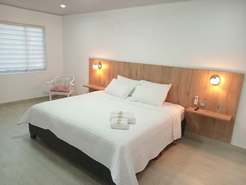 Postel nebo postele na pokoji v ubytování Hotel Divaca
