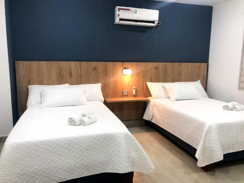 Postel nebo postele na pokoji v ubytování Hotel Divaca
