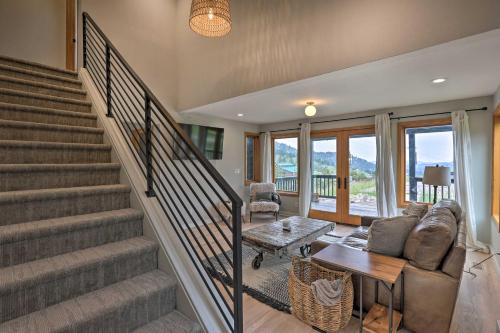 a living room with a couch and a table at Modern Evergreen Duplex Off I-70 with Mountain Views in Idaho Springs