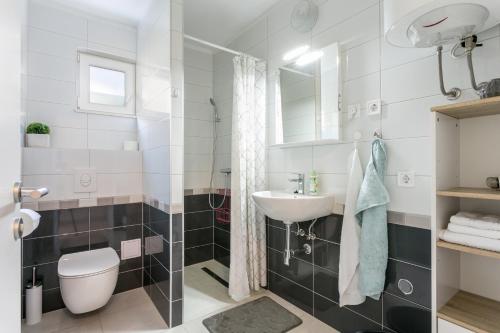 Koupelna v ubytování Apartment Podstrana 17586b