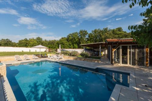 Family friendly house with a swimming pool Lovrecica, Umag - 22979