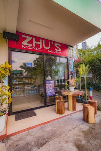 a zitzinator shop with a sign on the front of it at Villa de Gloria in Dauis