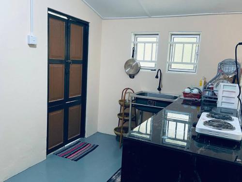 Kuchyň nebo kuchyňský kout v ubytování Inap Desa R'Sawit - Whole house