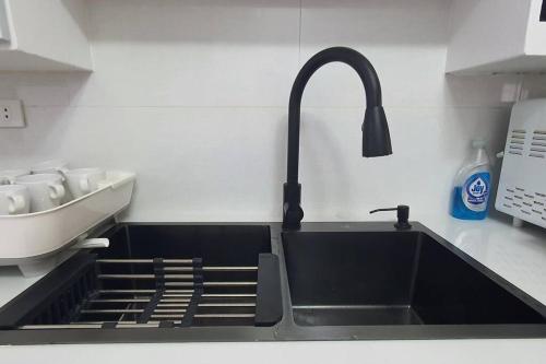 Kuchyň nebo kuchyňský kout v ubytování Mango Oasis 1