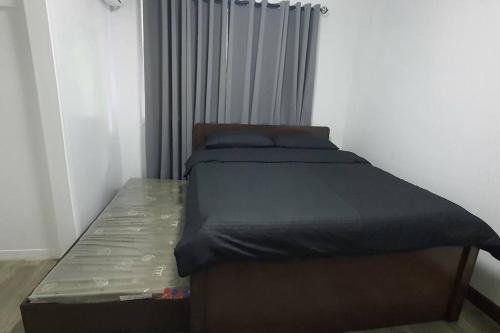 Postel nebo postele na pokoji v ubytování Mango Oasis 1