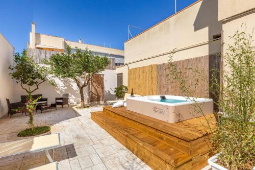 a bath tub on the side of a building at Salento Inside in Morciano di Leuca