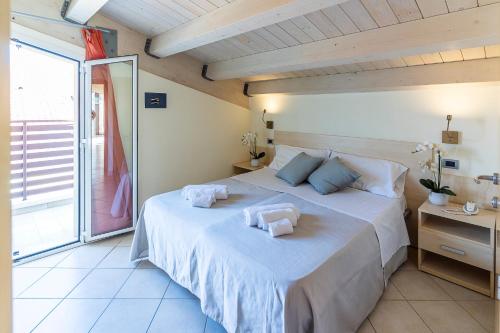 Letto o letti in una camera di Melody Hotel