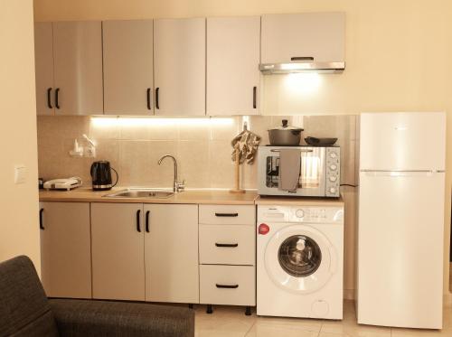 Kuchyň nebo kuchyňský kout v ubytování Maria's appartments