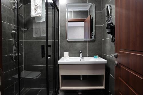 Koupelna v ubytování Mays Royal Hotel