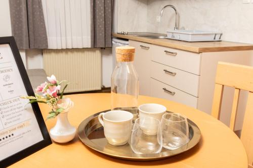 Příslušenství pro přípravu čaje a kávy v ubytování Guesthouse Špenko