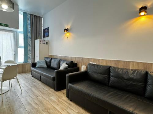 a living room with a couch and a table at Rodrigues 15 in Valencia